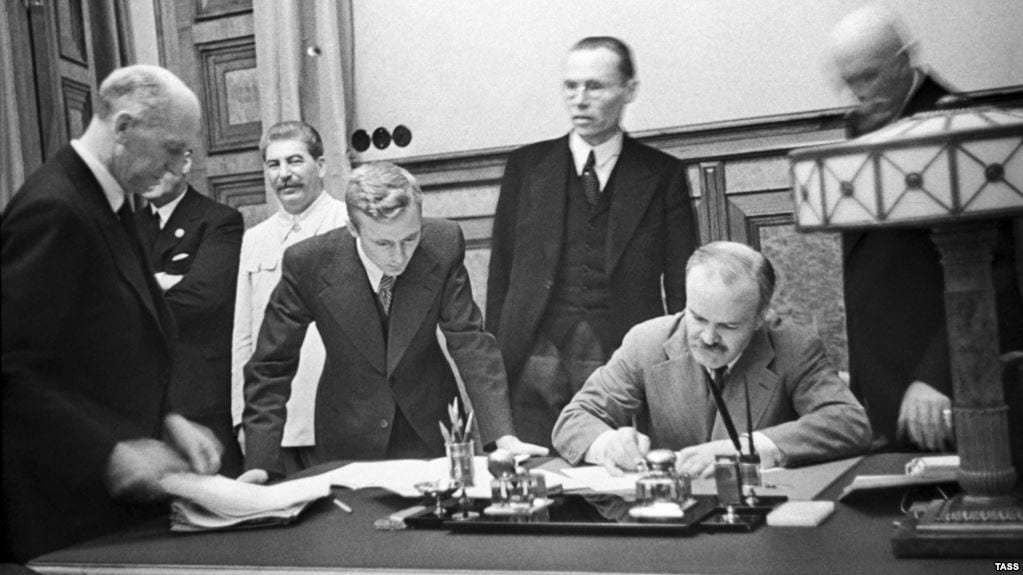 Signing of Molotov-Ribbentrop. Molotov is seen signing here
